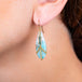 Draped amazonite earring on a model