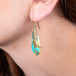Draped turquoise lagoon earrings side view