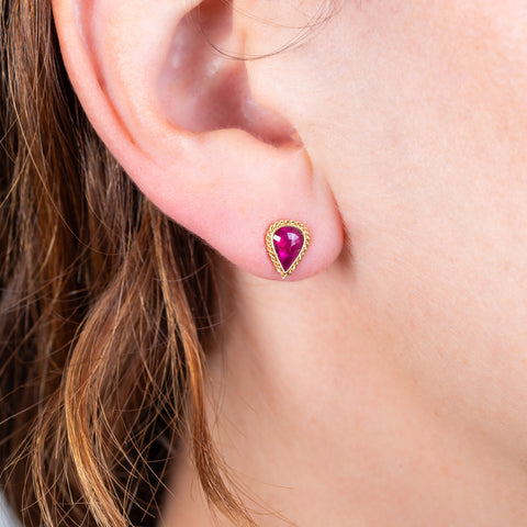Ruby teardrop earrings on a model