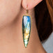 labradorite earrings on model close up