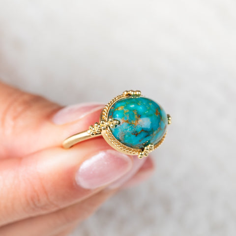 Turquoise and gold ring side view