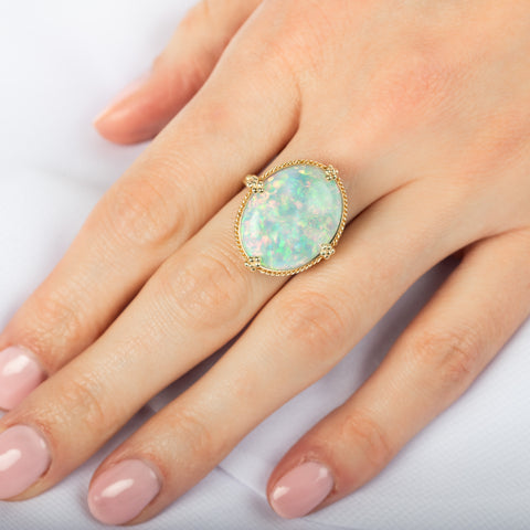 Large oval ethiopian opal ring on model