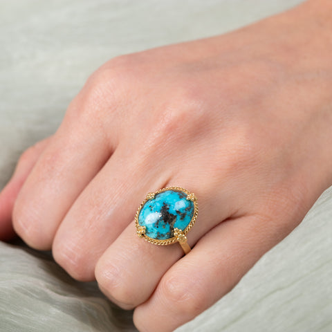 Oval turquoise ring on model