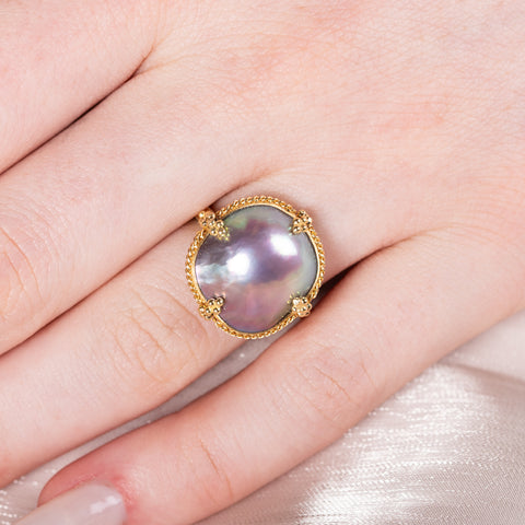 Mabe pearl ring on model