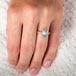 Aquamarine and gold ring on model