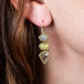 Colorful diamond earrings on model