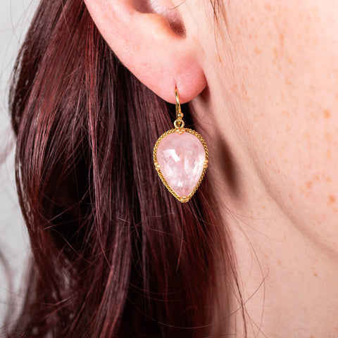 Morganite earrings on a model