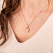 Morganite necklace on model side view