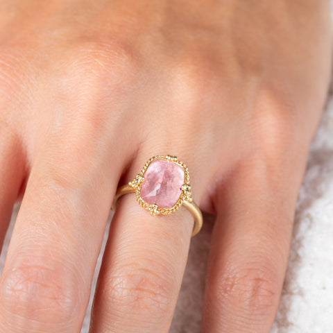 Morganite and gold ring on model