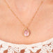 Morganite oval necklace on model