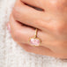 Morganite and gold ring on model