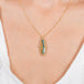 Opalized wood necklace on a model