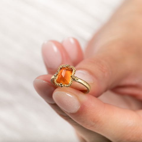 Orange Spessartite and gold ring