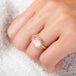 Morganite and gold ring on model side view