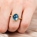 Oval moonstone ring on model close up