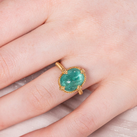 Paraiba tourmaline tranquility ring on a model