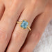 Aquamarine and gold ring on model