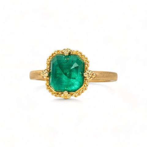 Emerald ring on white background