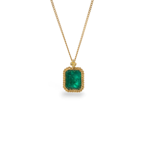 Emerald necklace on white background