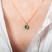 Emerald teardrop necklace on model