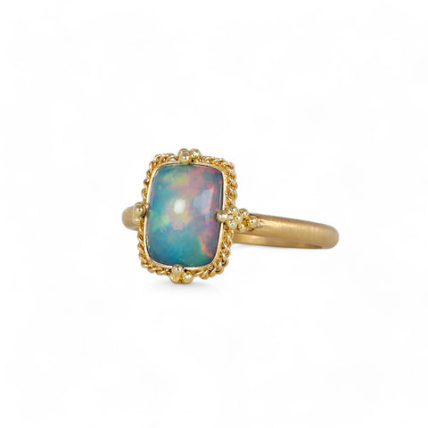 Petite ethiopian opal ring side view