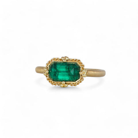 Petite emerald ring on white
