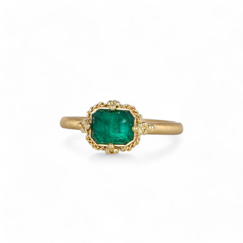 Petite emerald ring on white