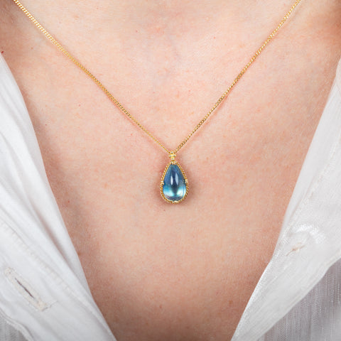 Moonstone teardrop necklace on model