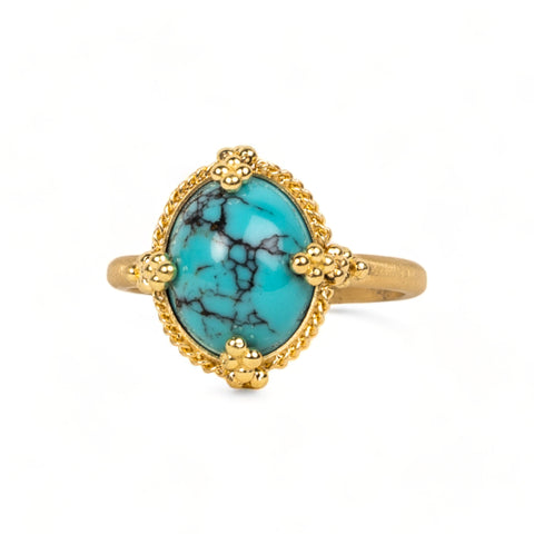 Oval turquoise ring on white background