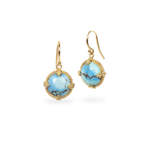 Turquoise earrings on white background