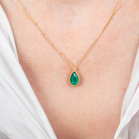 Emerald necklace on model