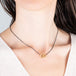 Contrast interlocking hoops necklace on a model