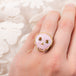 Pink Opal skull ring on a model