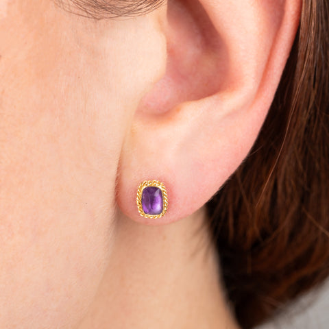 Purple amethyst stud earrings on model