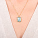Rectangular aquamarine necklace on a model