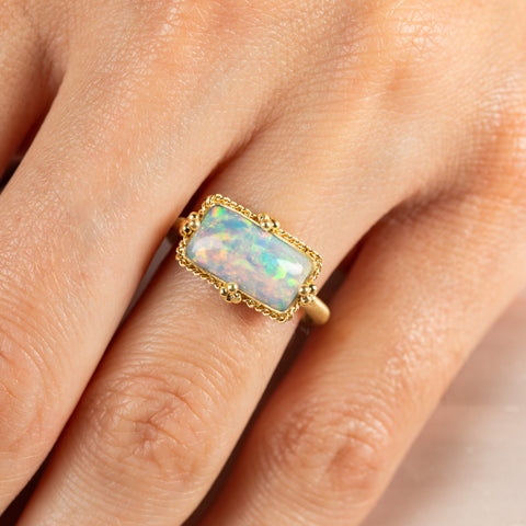 Rectangular ethiopian opal on model close up