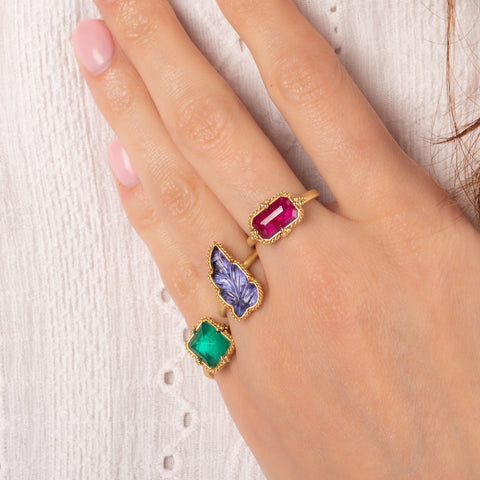 Tanzanite leaf ring paired with Emerald and Ruby rings
