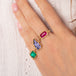 Tanzanite leaf ring paired with Emerald and Ruby rings