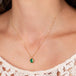 Emerald necklace on model 