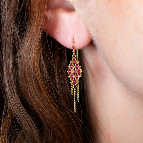 Ruby earrings on model