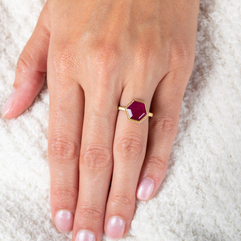 Ruby and gold ring on model