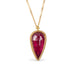 Ruby and gold necklace on white