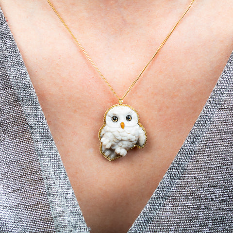 Snowy owl necklace on model