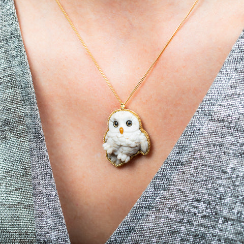 Snowy owl necklace on model