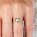 Diamond and gold ring on model