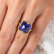 Tanzanite and gold ring on model