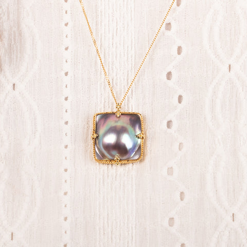 Square mabe pearl necklace on model