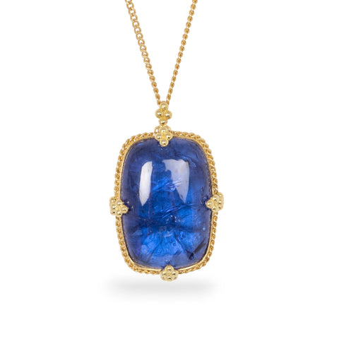 Tanzanite necklace on white background