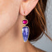 Tanzanite and tourmaline earrings on model