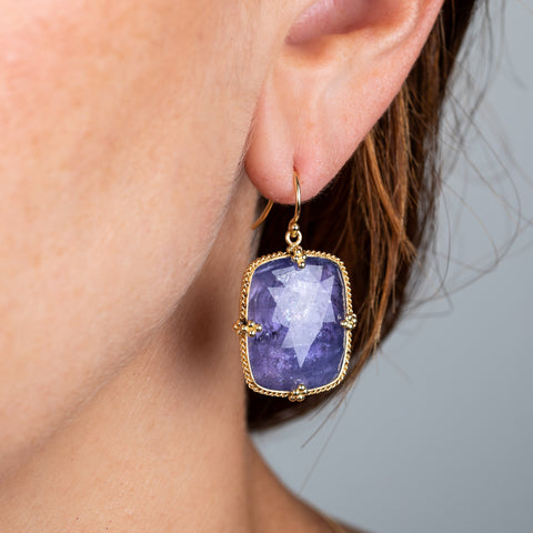 tanzanite earrings on model